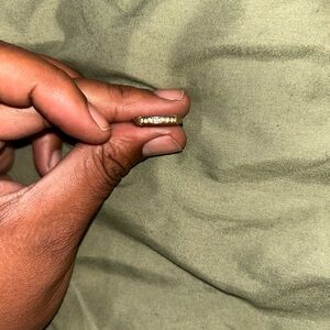 Gold and White Diamond Rings with Intricate Detailing